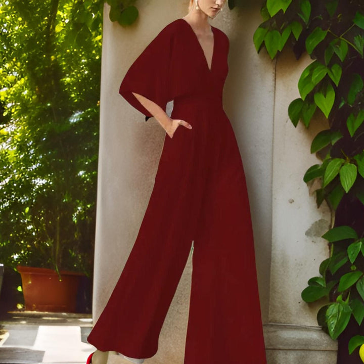 V-nyakú jumpsuit háromnegyedes ujjal - Aurora Chic